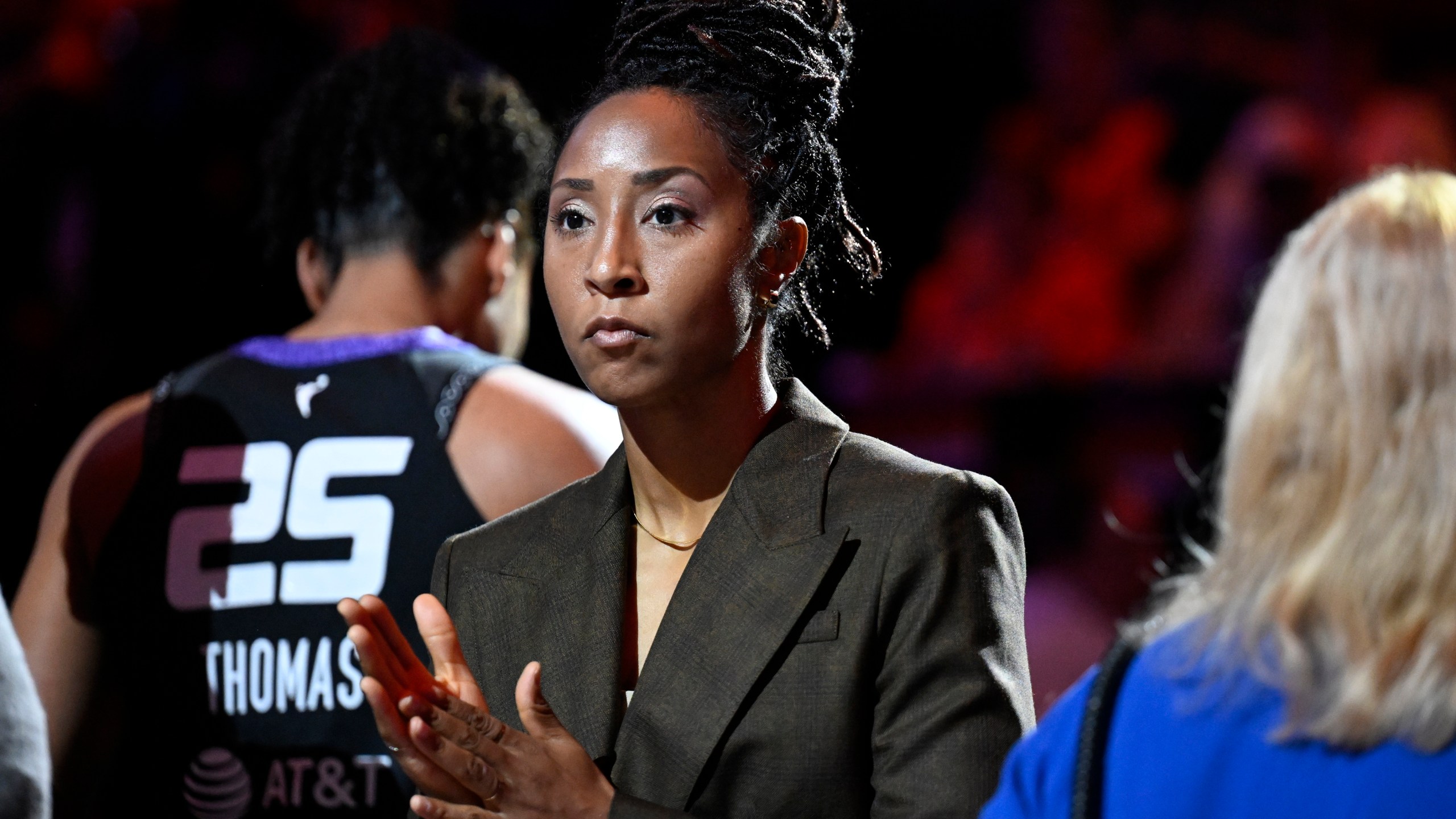 FILE - Connecticut Sun assistant coach Briann January at the start of a WNBA basketball semifinal game against the Minnesota Lynx, Oct. 4, 2024, in Uncasville, Conn. (AP Photo/Jessica Hill, File)