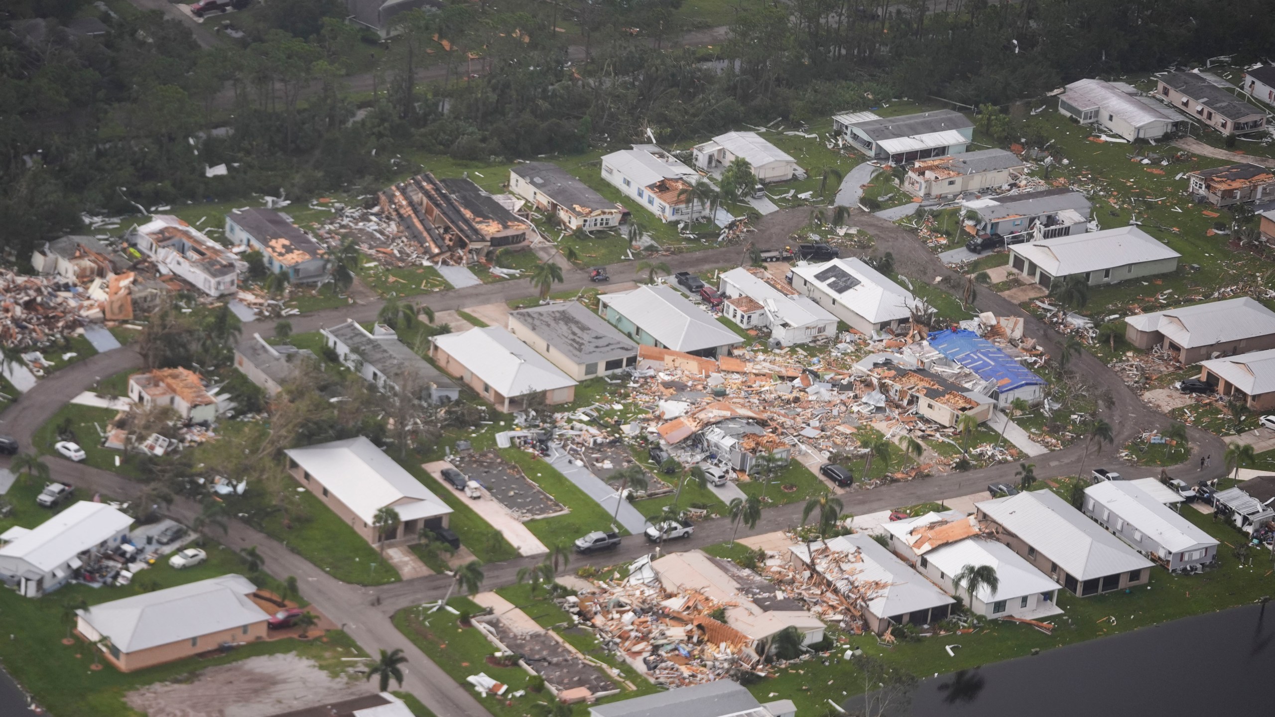 Neighborhoods destroyed by tornadoes are seen in this aerial photo in the aftermath of Hurricane Milton, Thursday, Oct. 10, 2024, in Fort Pierce, Fla. (AP Photo/Gerald Herbert)