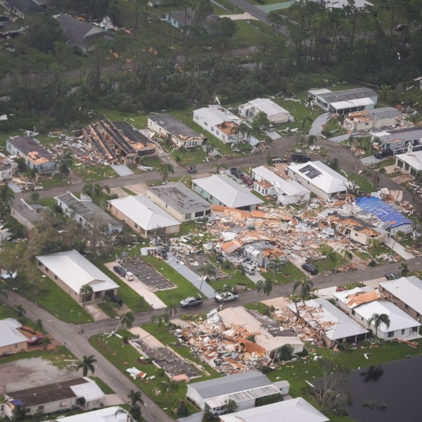 Neighborhoods destroyed by tornadoes are seen in this aerial photo in the aftermath of Hurricane Milton, Thursday, Oct. 10, 2024, in Fort Pierce, Fla. (AP Photo/Gerald Herbert)