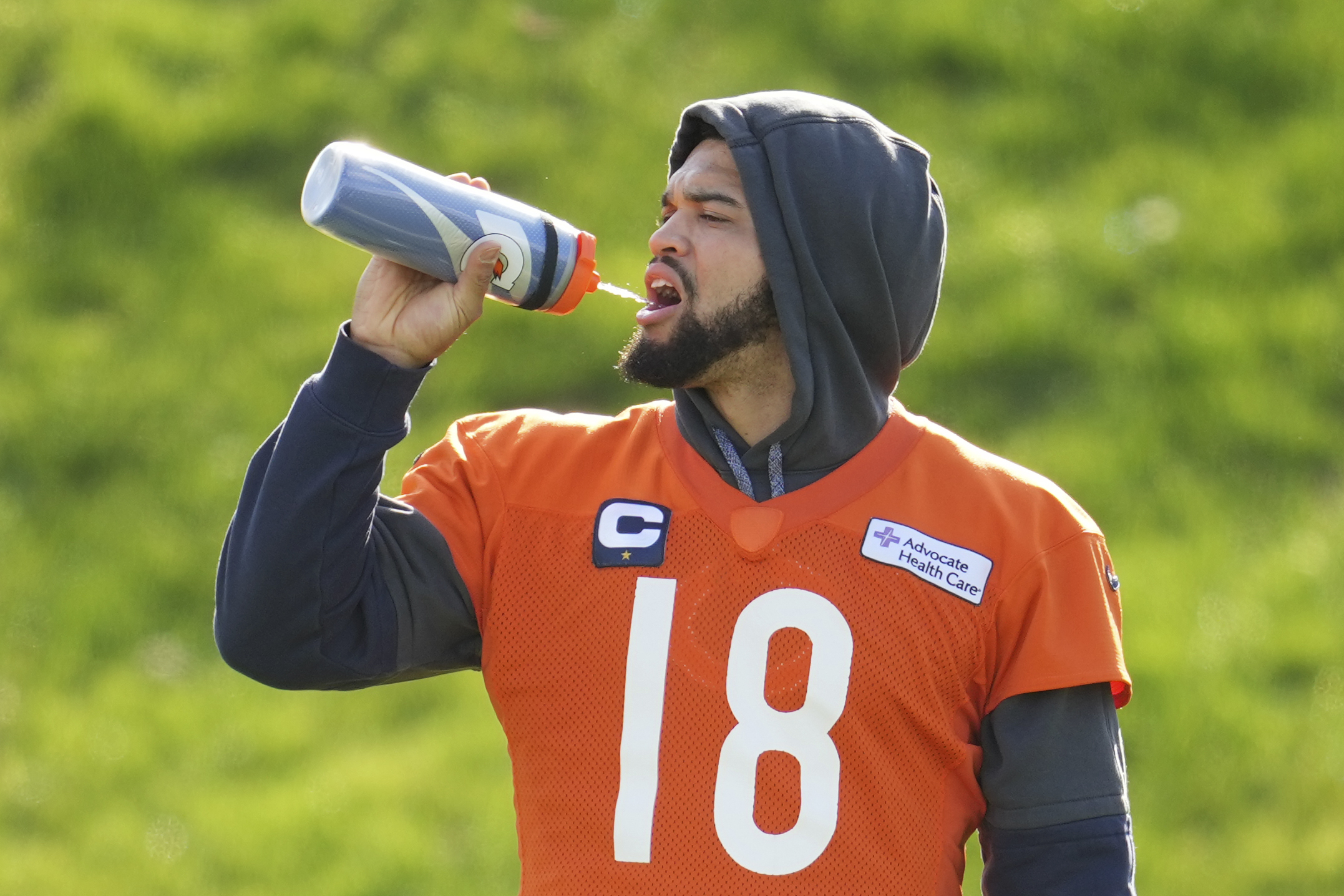 Chicago Bears quarterback Caleb Williams (18) participates in a NFL football training session in Ware, England, Friday, Oct. 11, 2024, ahead of the game against the Jacksonville Jaguars at the Tottenham Hotspur stadium on Sunday. (AP Photo/Kin Cheung)