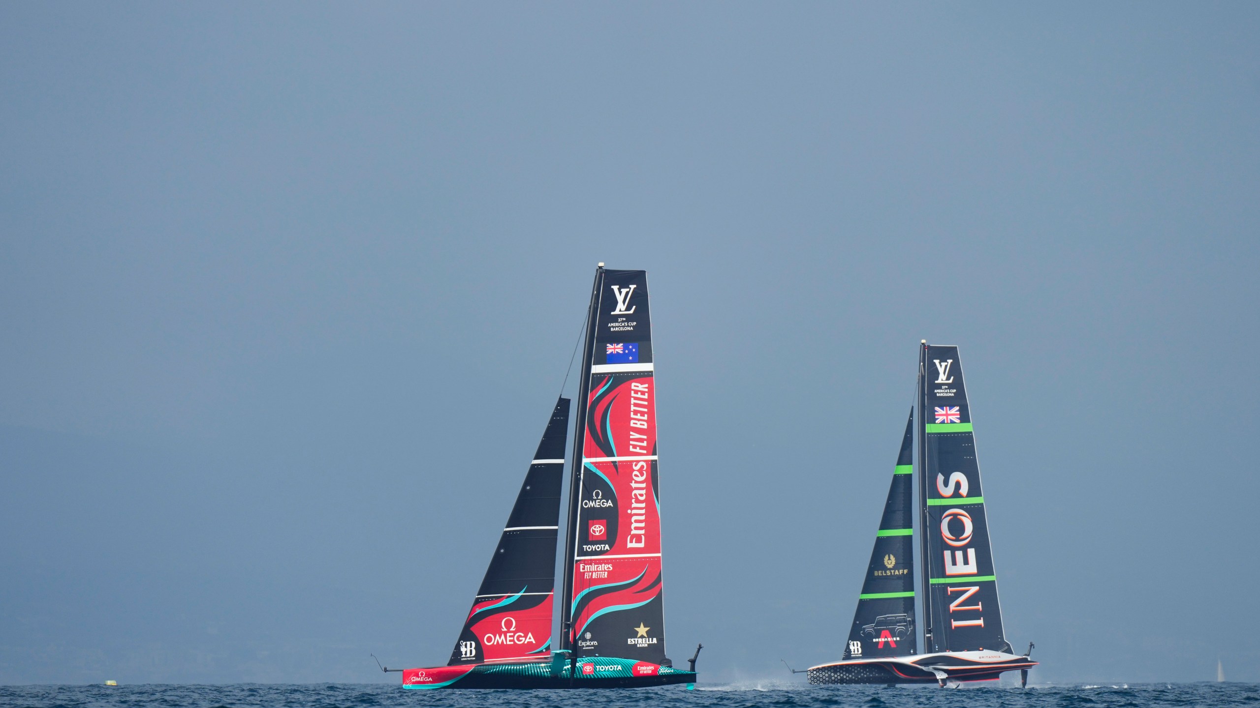 Ineos Britannia and Emirates Team New Zealand race during the Louis Vuitton 37th America's Cup race in Barcelona, Spain, Saturday, Oct. 12, 2024. (AP Photo/Bernat Armangue)