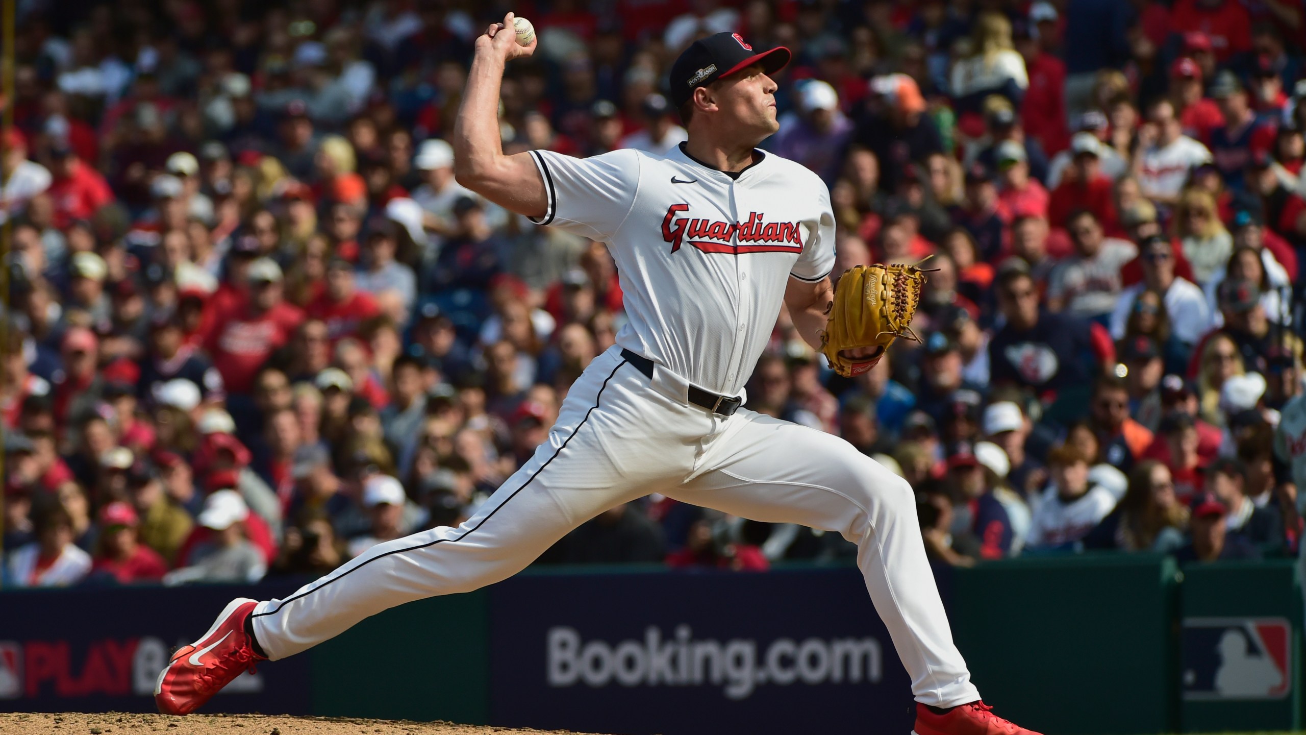 Cleveland Guardians' Cade Smith pitches in the third inning during Game 5 of baseball's American League Division Series against the Detroit Tigers, Saturday, Oct. 12, 2024, in Cleveland. (AP Photo/Phil Long)