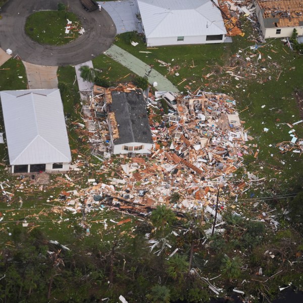 Neighborhoods destroyed by tornadoes are seen in this aerial photo in the aftermath of Hurricane Milton, Thursday, Oct. 10, 2024, in Fort Pierce, Fla. (AP Photo/Gerald Herbert)