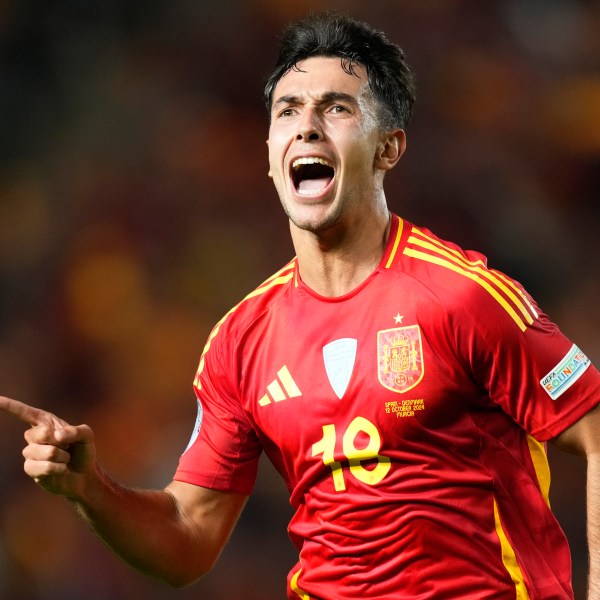 Spain's Martín Zubimendi celebrates after scoring the opening goal during the UEFA Nations League group 4 soccer match between Spain and Denmark in Murcia, Spain, Saturday, Oct. 12, 2024. (AP Photo/Jose Breton)