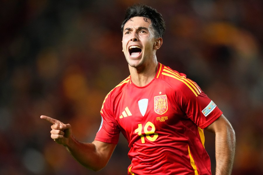 Spain's Martín Zubimendi celebrates after scoring the opening goal during the UEFA Nations League group 4 soccer match between Spain and Denmark in Murcia, Spain, Saturday, Oct. 12, 2024. (AP Photo/Jose Breton)