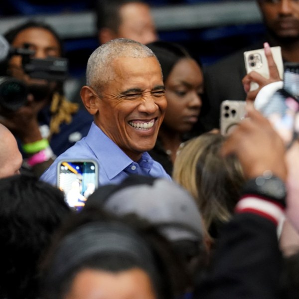 Former President Barack Obama greets attendees after speaking at a campaign rally supporting Democratic presidential nominee Vice President Kamala Harris, Thursday, Oct. 10, 2024, at the University of Pittsburgh's Fitzgerald Field House in Pittsburgh. (AP Photo/Matt Freed)