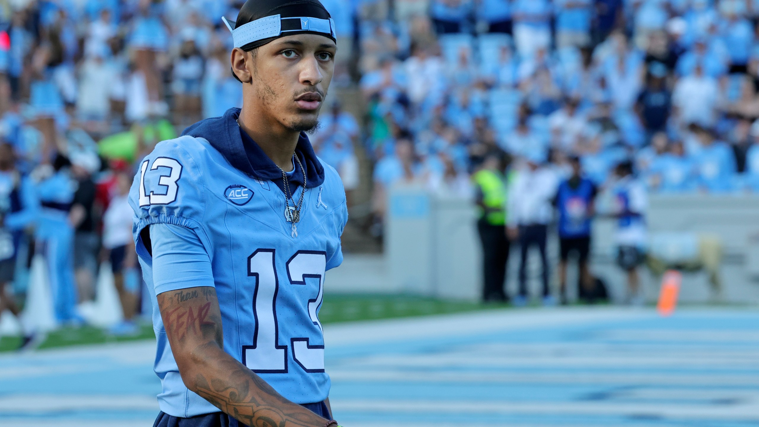 FILE - North Carolina wide receiver Tylee Craft (13) walks the bench during the second half of an NCAA college football game against Minnesota, Sept. 16, 2023, in Chapel Hill, N.C. (AP Photo/Reinhold Matay, File)