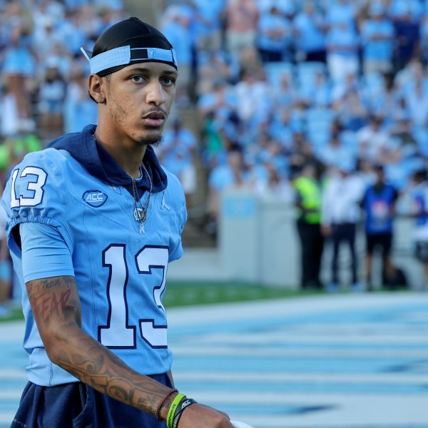 FILE - North Carolina wide receiver Tylee Craft (13) walks the bench during the second half of an NCAA college football game against Minnesota, Sept. 16, 2023, in Chapel Hill, N.C. (AP Photo/Reinhold Matay, File)