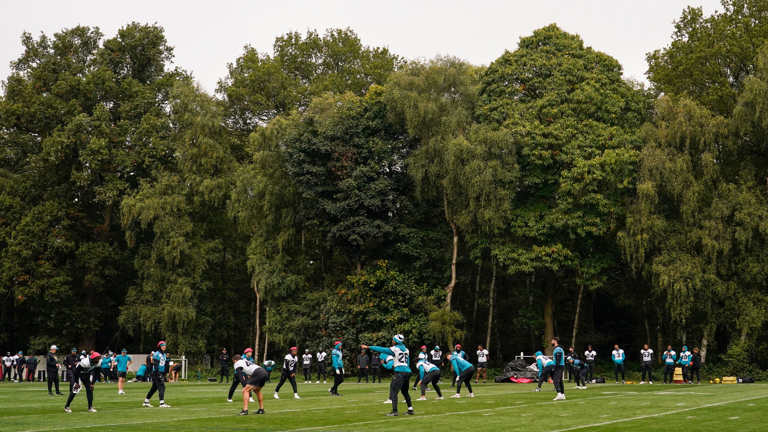 Jacksonville Jaguars players participate in a NFL football training session in Watford, near London, Saturday, Oct. 12, 2024, ahead of the game against the Chicago Bears at the Tottenham Hotspur stadium on Sunday. (AP Photo/Alberto Pezzali)