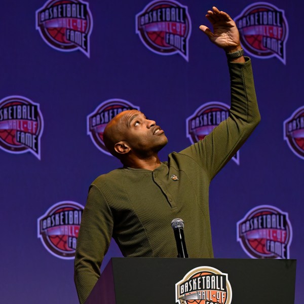 Basketball Hall of Fame Class of 2024 inductee Vince Carter gestures during a hall of fame news conference at Mohegan Sun, Saturday, Oct. 12, 2024, in Uncasville, Conn. (AP Photo/Jessica Hill)