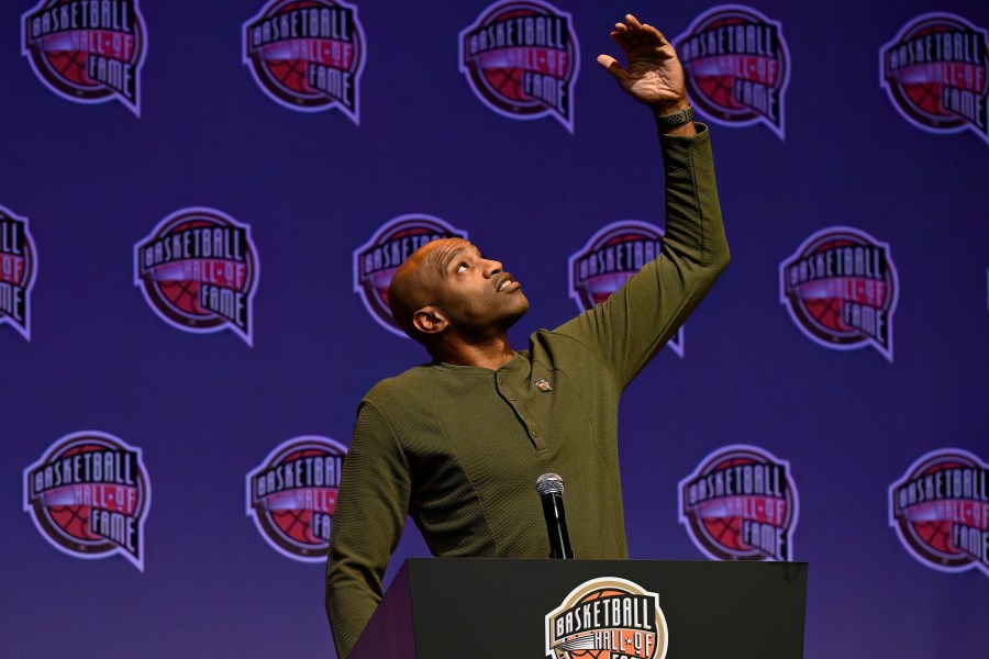 Basketball Hall of Fame Class of 2024 inductee Vince Carter gestures during a hall of fame news conference at Mohegan Sun, Saturday, Oct. 12, 2024, in Uncasville, Conn. (AP Photo/Jessica Hill)