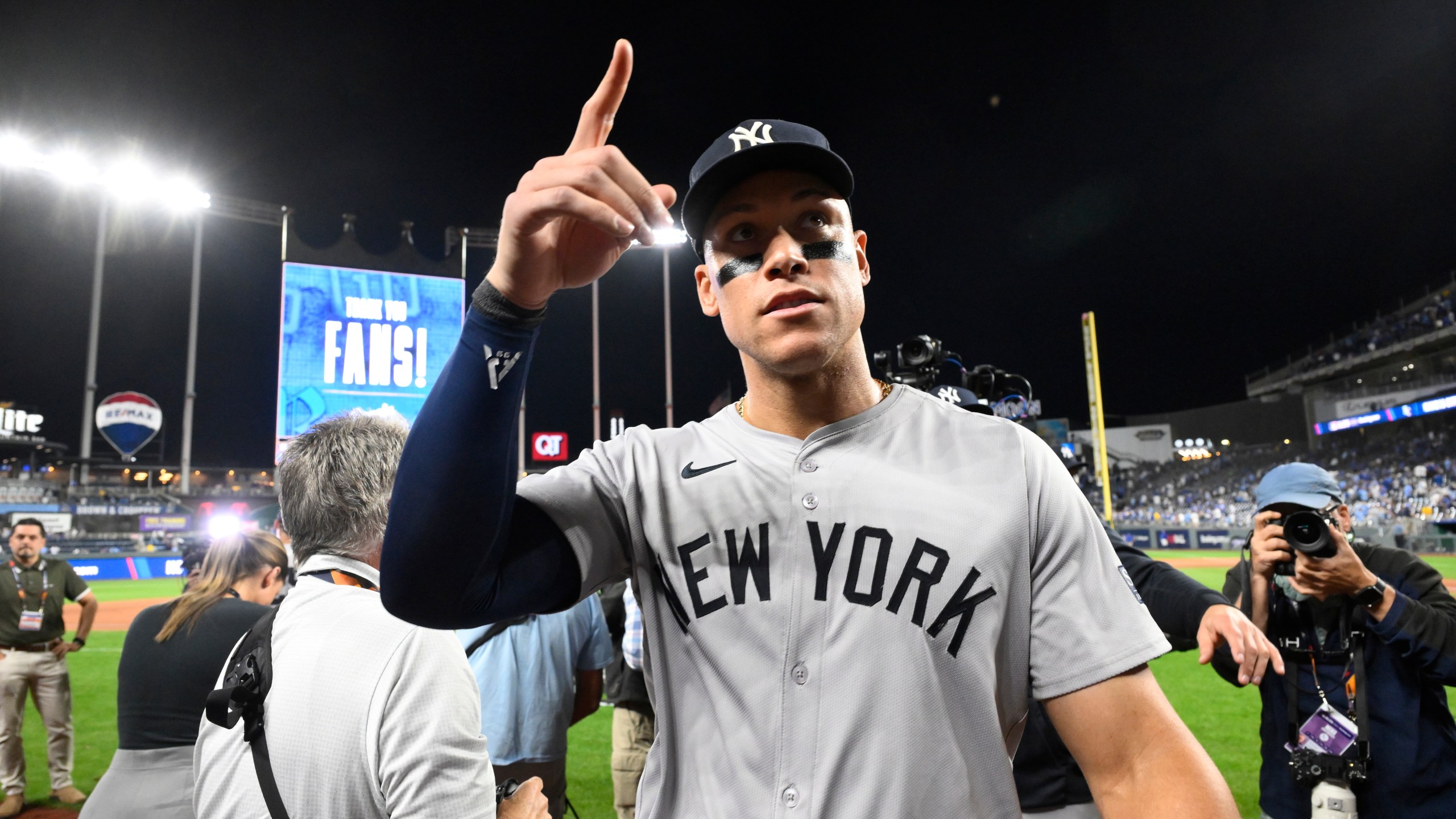 New York Yankees' Aaron Judge celebrates a 3-1 victory over the Kansas City Royals in Game 4 of an American League Division baseball playoff series Thursday, Oct. 10, 2024, in Kansas City, Mo (AP Photo/Reed Hoffmann)