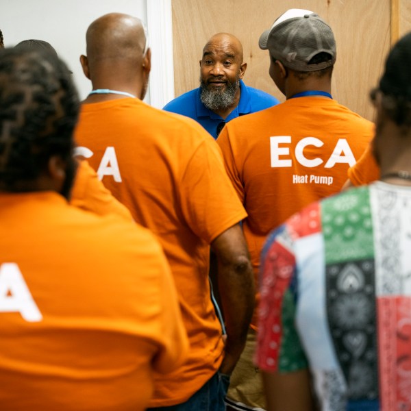 Jackie Robinson, an instructor at the Energy Coordinating Agency, a nonprofit focused in part on energy equity, teaches a class at the facility on Tuesday, July 2, 2024, in Philadelphia. (AP Photo/Joe Lamberti)