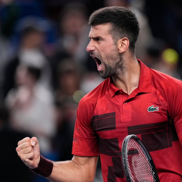 Novak Djokovic of Serbia reacts after defeating Taylor Fritz of the United States in the men's singles semifinals match of the Shanghai Masters tennis tournament at Qizhong Forest Sports City Tennis Center in Shanghai, China, Saturday, Oct. 12, 2024. (AP Photo/Andy Wong)