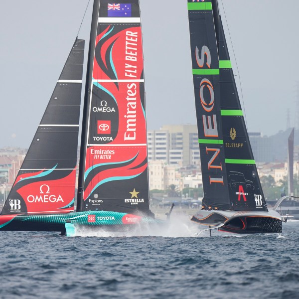 Ineos Britannia and Emirates Team New Zealand race during the Louis Vuitton 37th America's Cup Day 2 race in Barcelona, Spain, Sunday, Oct. 13, 2024. (AP Photo/Bernat Armangue)