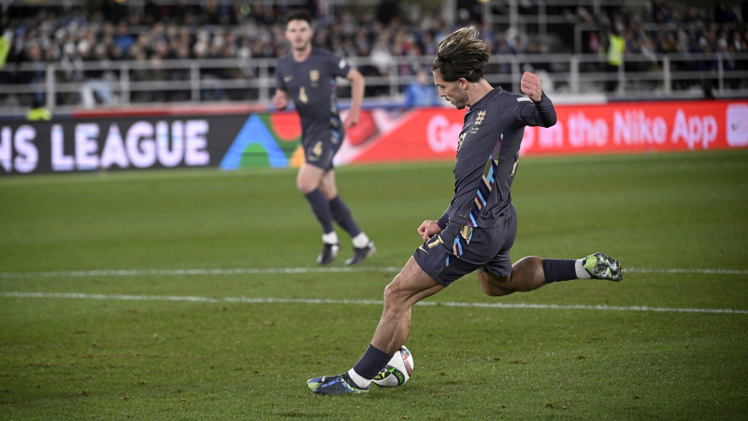 Jack Grealish of England scores the opening goal during the UEFA Nations League soccer match between Finland and England, at the Olympic Stadium in Helsinki, Finland, Sunday, Oct. 13, 2024. (Antti Aimo-Koivisto/Lehtikuva via AP)