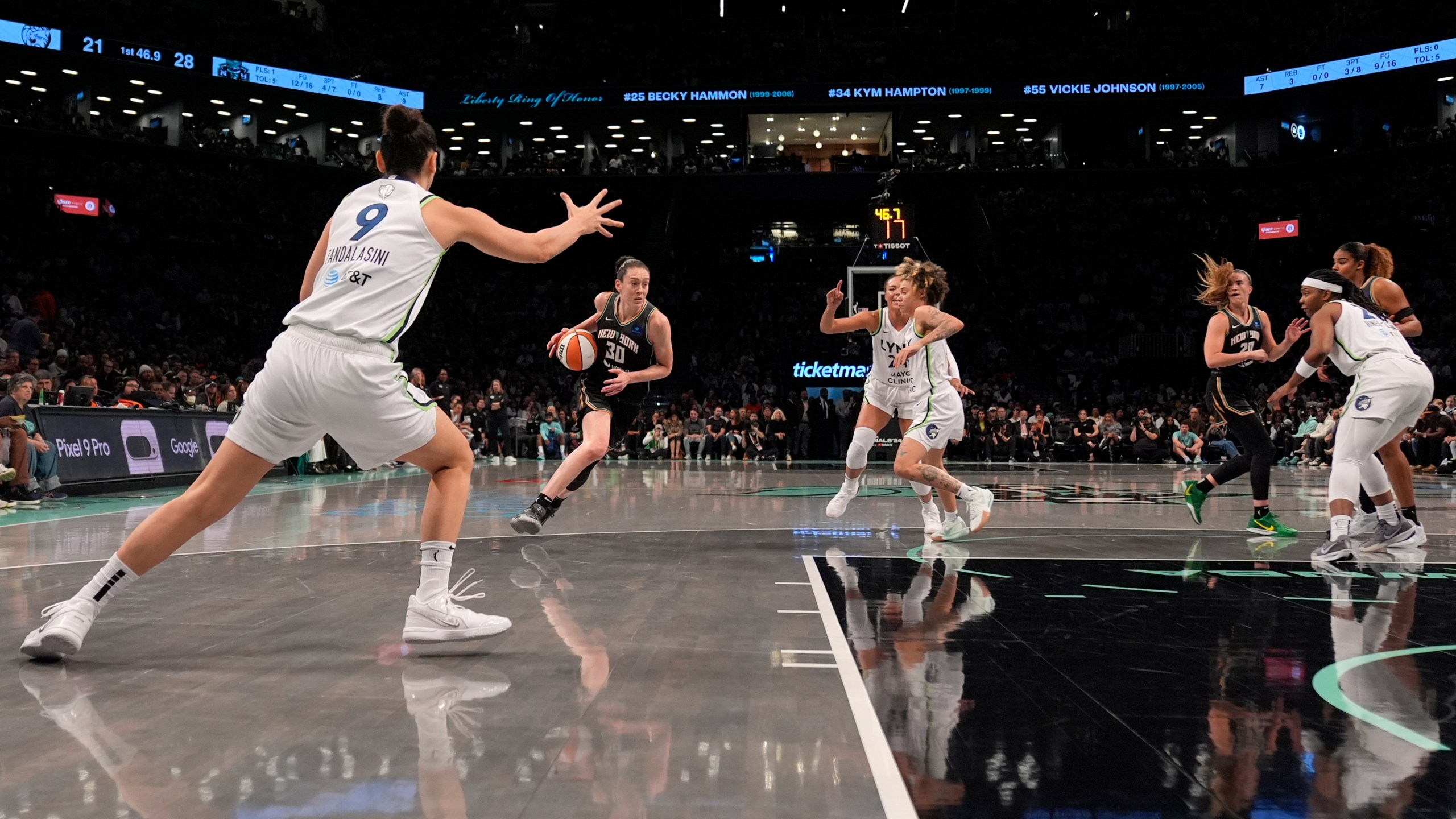 New York Liberty's Breanna Stewart (30) dribbles during the first half in Game 2 of a WNBA basketball final playoff series against the Minnesota Lynx, Sunday, Oct. 13, 2024, in New York. (AP Photo/Pamela Smith)