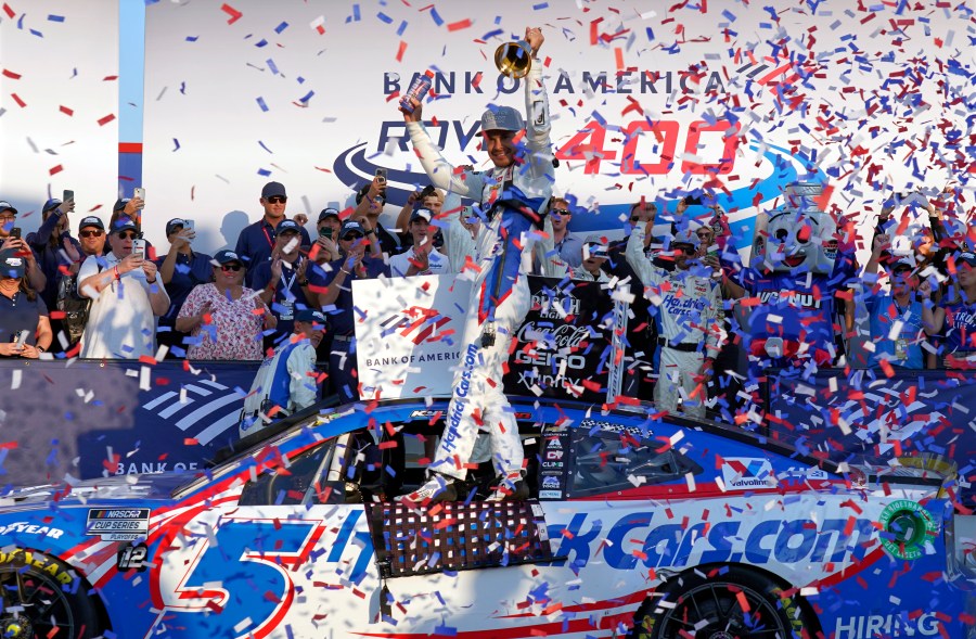 Kyle Larson, center, celebrates in Victory Lane after winning a NASCAR Cup Series auto race at Charlotte Motor Speedway in Concord, N.C., Sunday, Oct. 13, 2024. (AP Photo/Chuck Burton)