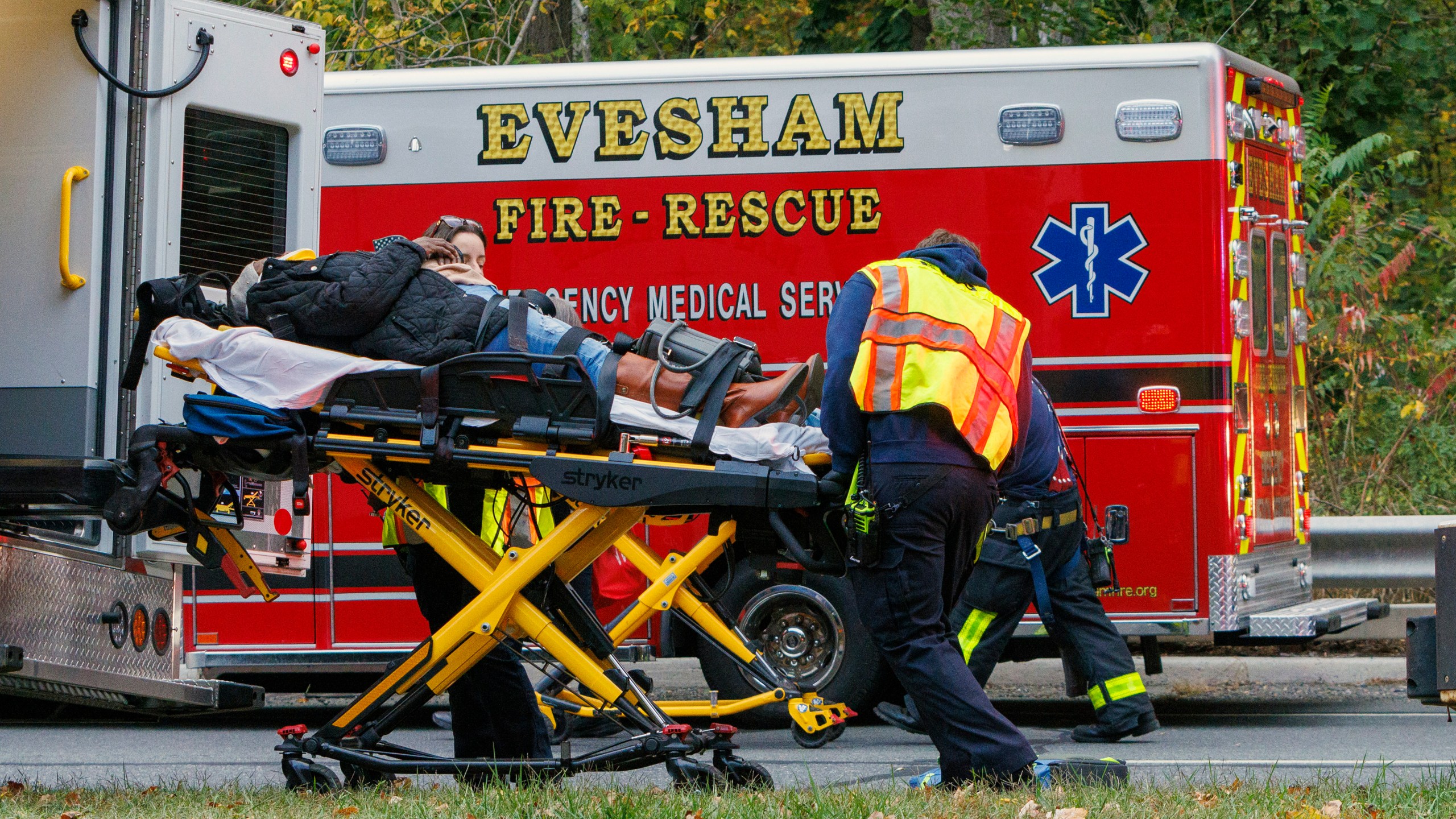 Medics attended to injured alongr Rt. 130. Train accident Mansfield Twp, NJ, New Jersey Transit Light Rail, accident, Monday, Oct. 14, 2024. (Alejandro A. Alvarez/The Philadelphia Inquirer via AP)