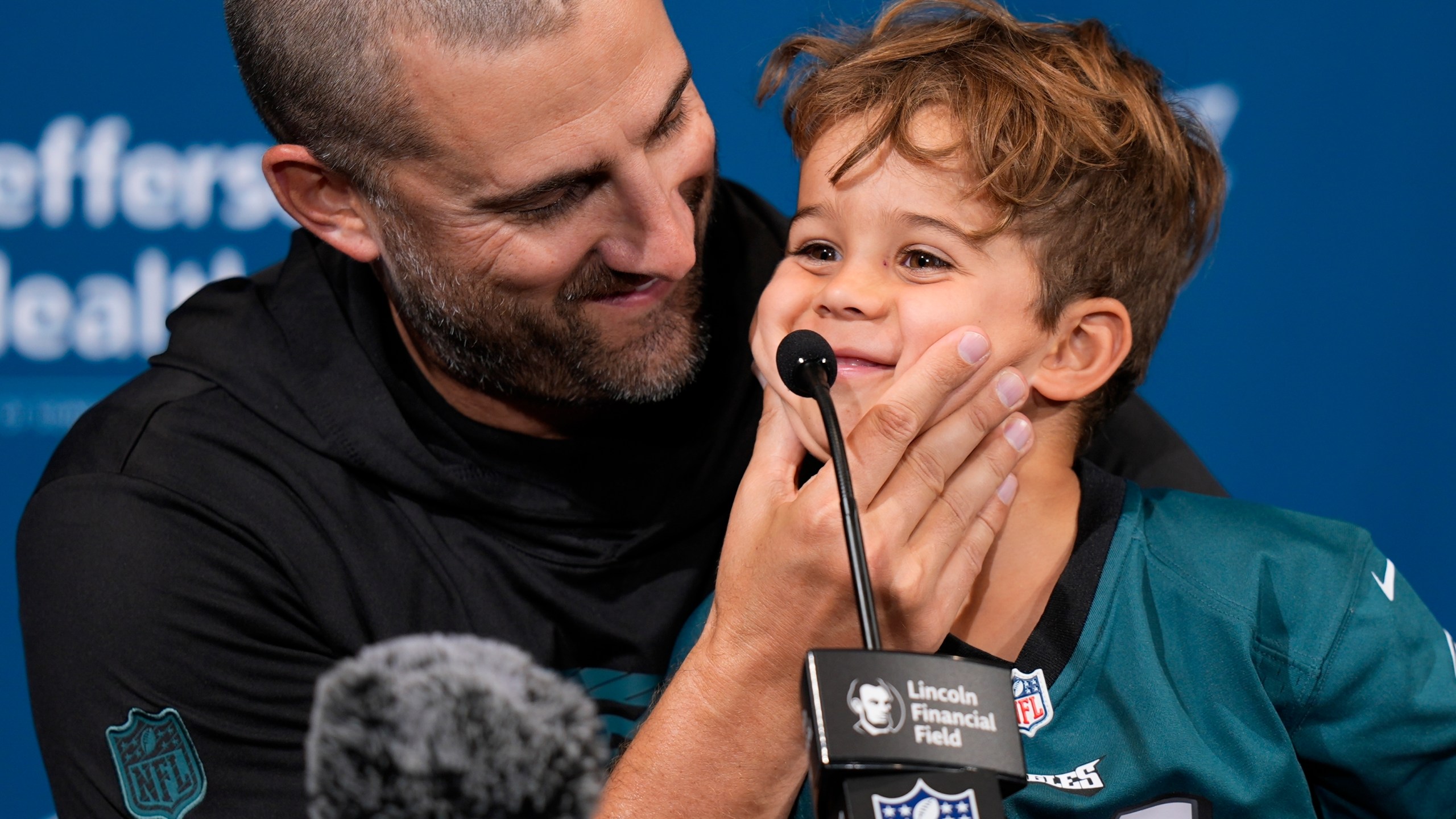 Philadelphia Eagles head coach Nick Sirianni speaks during a news conference with son Miles after an NFL football game against the Cleveland Browns on Sunday, Oct. 13, 2024, in Philadelphia. (AP Photo/Chris Szagola)