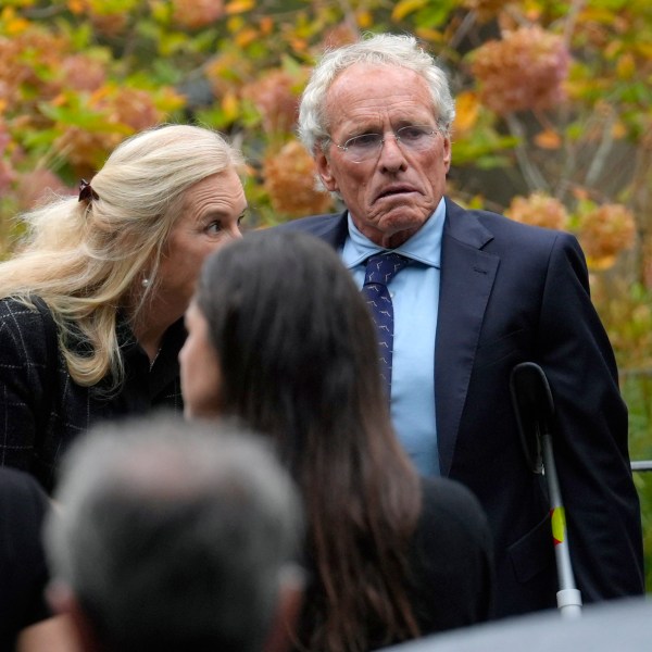 Former Massachusetts U.S. Rep. Joseph Kennedy II, center right, son of the late Ethel Kennedy, arrives at Our Lady of Victory church, for Ethel Kennedy's funeral, Monday, Oct. 14, 2024, in Centerville, Mass. (AP Photo/Steven Senne)