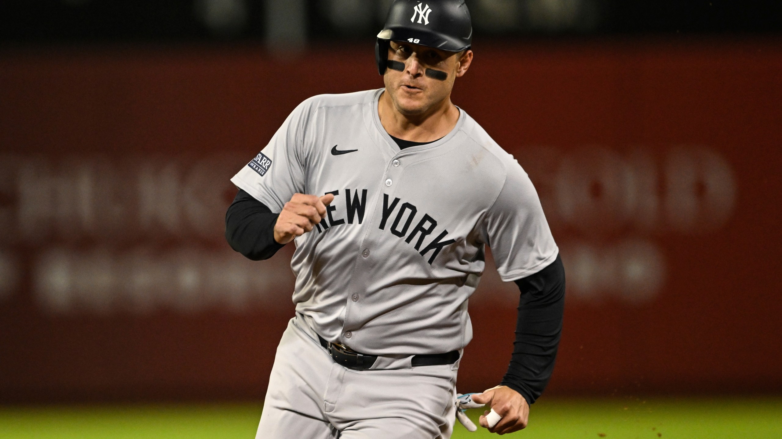 New York Yankees' Anthony Rizzo runs to third base during the fifth inning of a baseball game against the Oakland Athletics, Friday, Sept. 20, 2024, in Oakland, Calif. (AP Photo/Eakin Howard)