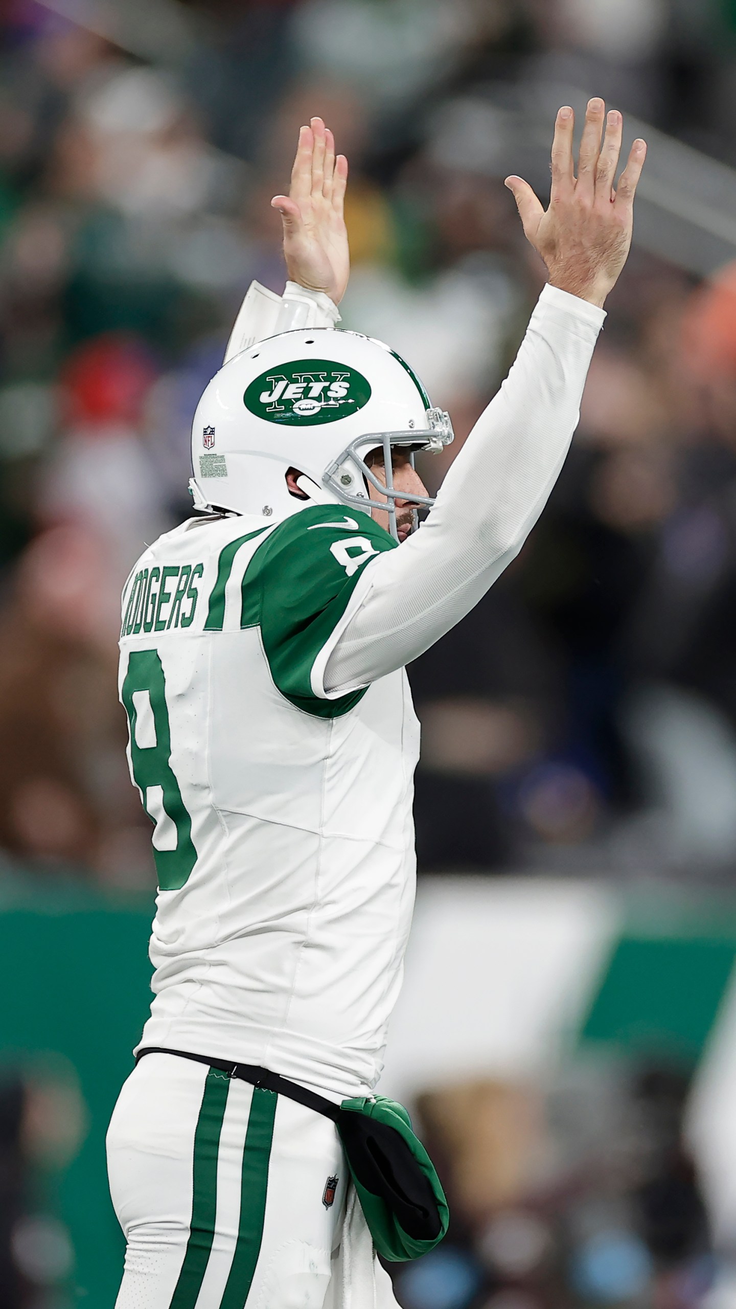 New York Jets quarterback Aaron Rodgers (8) celebrates after throwing a touchdown pass to wide receiver Allen Lazard during the first half of an NFL football game against the Buffalo Bills in East Rutherford, N.J., Monday, Oct. 14, 2024. (AP Photo/Adam Hunger)