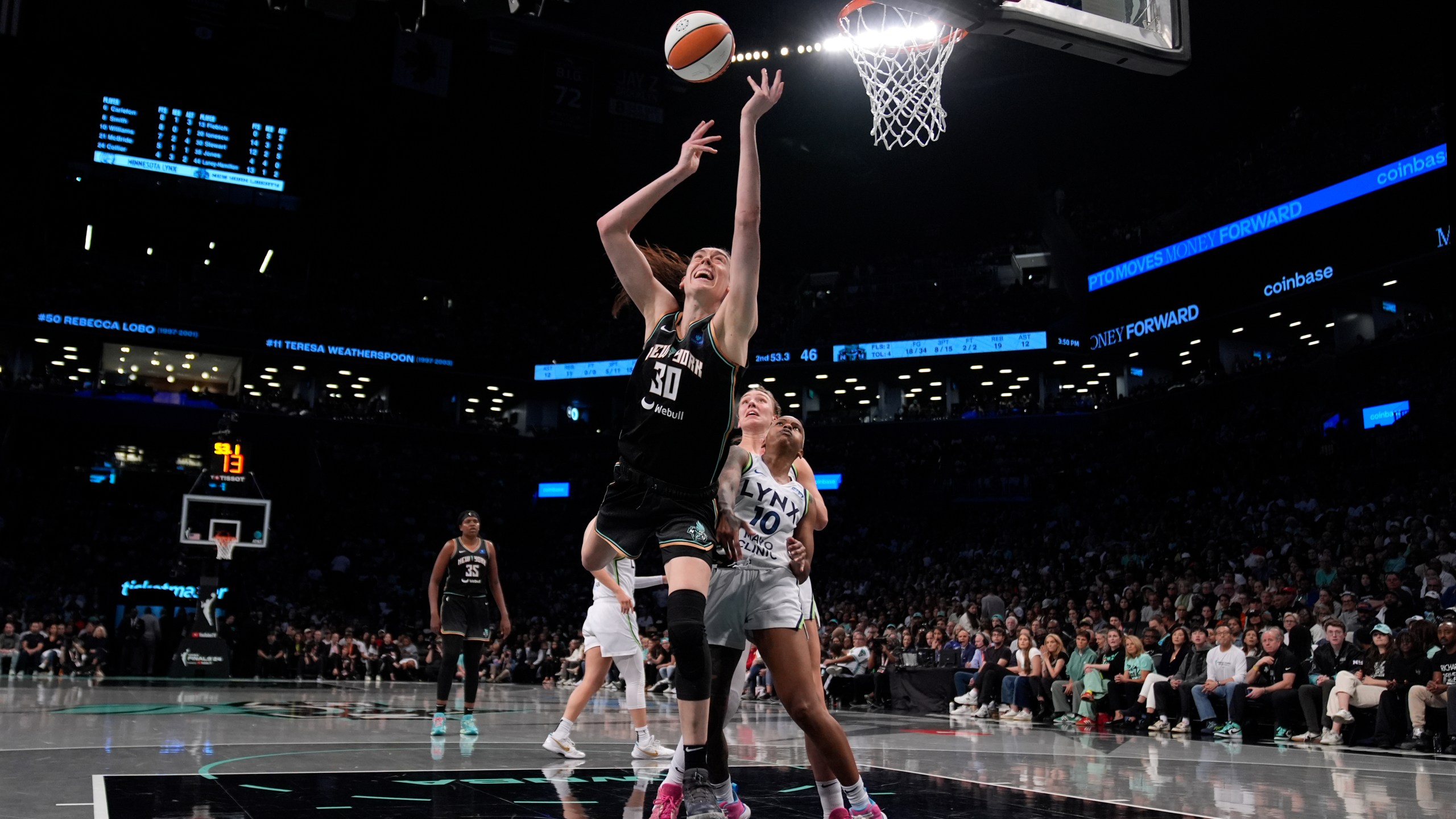 New York Liberty's Breanna Stewart (30) shoots during the first half in Game 2 of a WNBA basketball final playoff series against the Minnesota Lynx, Sunday, Oct. 13, 2024, in New York. (AP Photo/Pamela Smith)