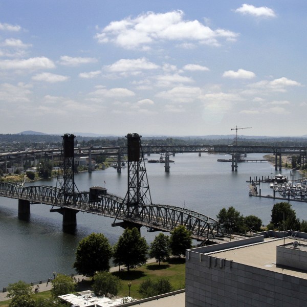 FILE - Several bridges spanning the Willamette River are shown in Portland, Ore., Aug. 1, 2012. (AP Photo/Don Ryan, File)