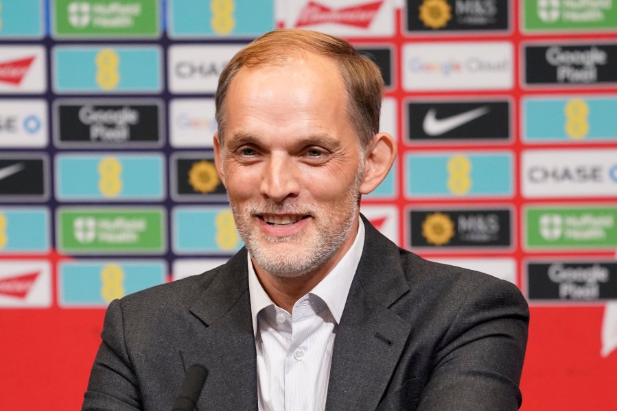 The newly appointed England men's soccer team manager Thomas Tuchel smiles as he speaks during a press conference held at Wembley Stadium in London, Wednesday, Oct. 16, 2024. (AP Photo/Alberto Pezzali)