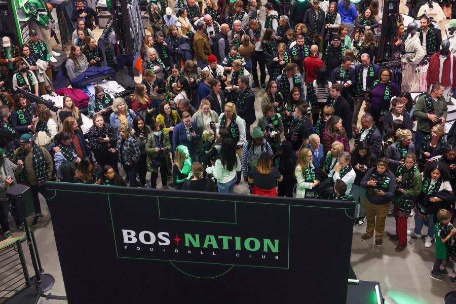 Fans gather during a kickoff celebration for National Women's Soccer League's Boston franchise, which is to be named BOS Nation Football Club, Tuesday, Oct.. 15, 2024, in Boston. (Barry Chin/The Boston Globe via AP)