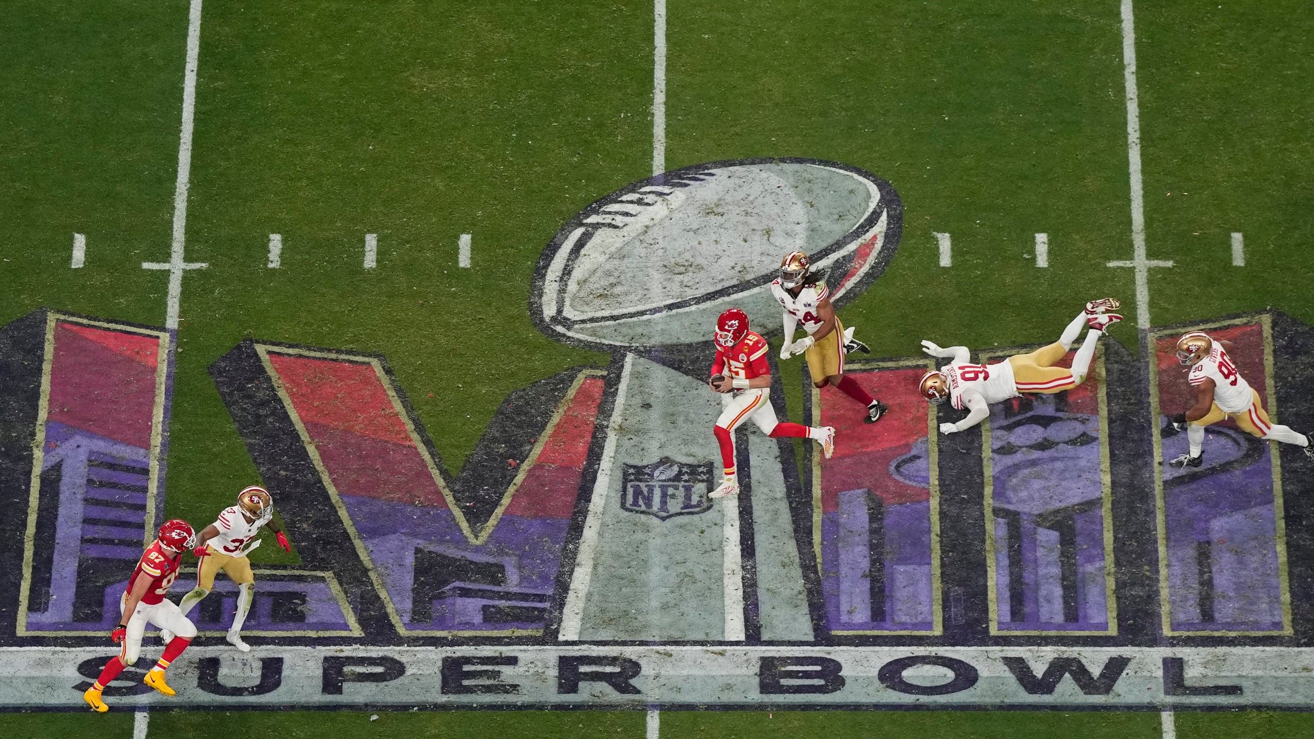 FILE - Kansas City Chiefs quarterback Patrick Mahomes runs with the ball against the San Francisco 49ers during overtime of the NFL Super Bowl 58 football game, Feb. 11, 2024, in Las Vegas. (AP Photo/Godofredo A. Vásquez, File)