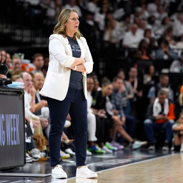 Minnesota Lynx head coach Cheryl Reeve watches from the bench during the second half against the New York Liberty in Game 3 of a WNBA basketball final playoff series, Wednesday, Oct. 16, 2024, in Minneapolis. (AP Photo/Abbie Parr)