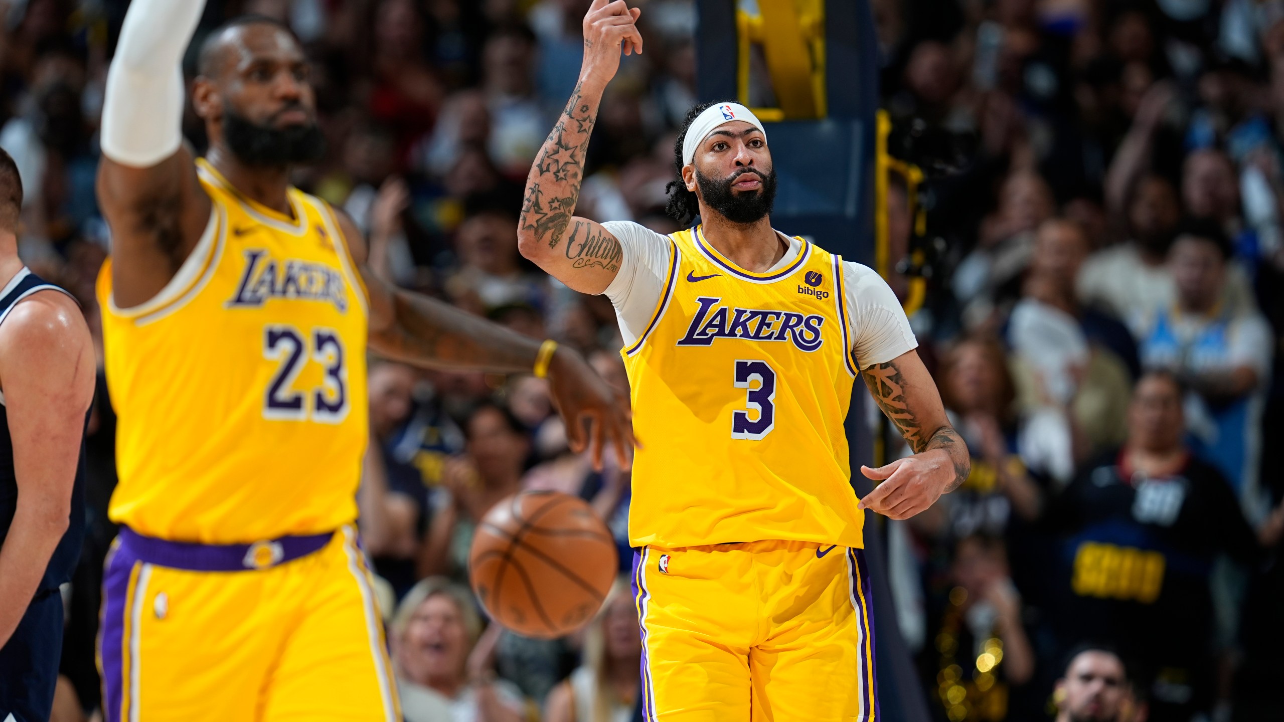 FILE - Los Angeles Lakers forwards LeBron James (23) and Anthony Davis (3) in the second half of Game 5 of an NBA basketball first-round playoff series Monday, April 29, 2024, in Denver. (AP Photo/David Zalubowski, File)