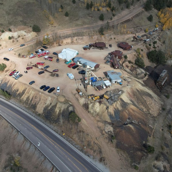 Emergency personnel stage outside the Mollie Kathleen Gold Mine in Cripple Creek, Colo., Thursday, Oct. 10, 2024, after one person died in an equipment malfunction during a tour of the mine according to the Teller County Sheriff's Department. (Arthur Trickette-Wile/The Gazette via AP)