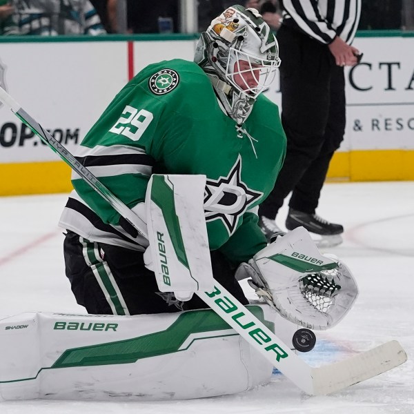 Dallas Stars goaltender Jake Oettinger (29) defends the goal during the second period of an an NHL hockey game against the San Jose Sharks Tuesday, Oct. 15, 2024, in Dallas. (AP Photo/LM Otero)