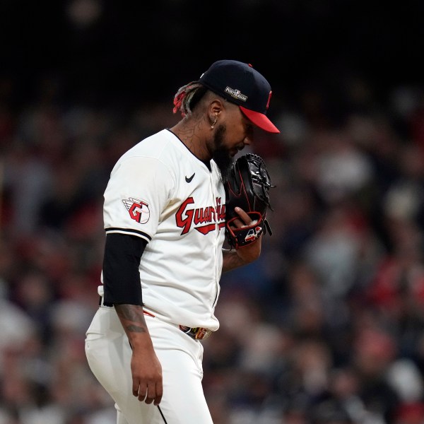 Cleveland Guardians relief pitcher Emmanuel Clase reacts after giving up a home run against the New York Yankees during the eighth inning in Game 3 of the baseball AL Championship Series Thursday, Oct. 17, 2024, in Cleveland.(AP Photo/Jeff Roberson)