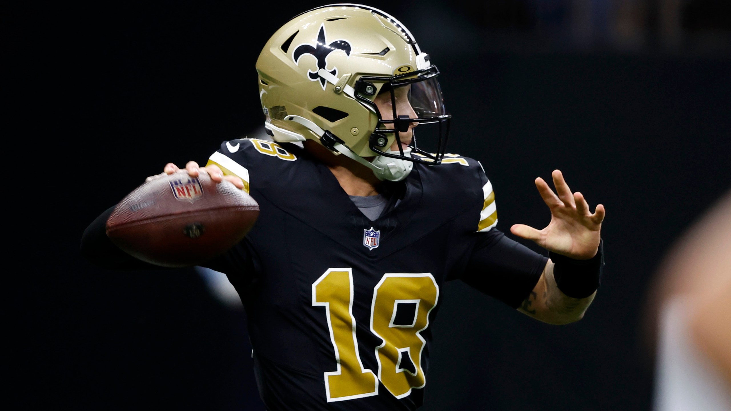 New Orleans Saints quarterback Spencer Rattler throws a pass during the first half of an NFL football game against the Denver Broncos, Thursday, Oct. 17, 2024, in New Orleans. (AP Photo/Butch Dill)