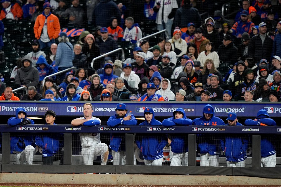 New York Mets watch during the ninth inning in Game 4 of a baseball NL Championship Series against the Los Angeles Dodgers, Thursday, Oct. 17, 2024, in New York. (AP Photo/Frank Franklin II)