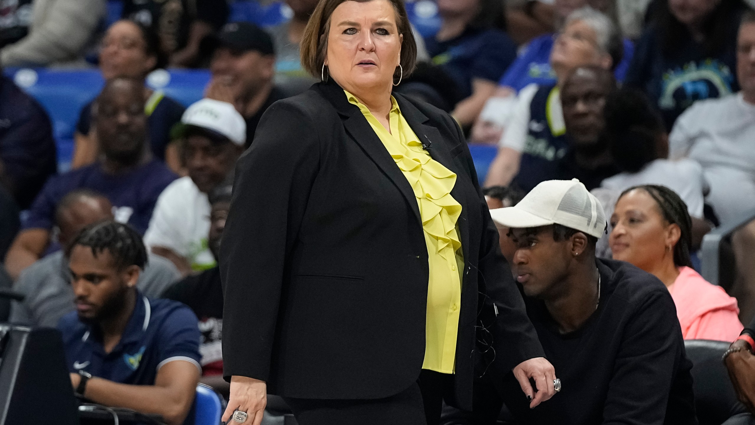 FILE - Dallas Wings head coach Latricia Trammell walks along the court during the second half of Game 3 of a WNBA basketball playoffs semifinal against the Las Vegas Aces, Sept. 29, 2023, in Arlington, Texas. (AP Photo/Sam Hodde, File)