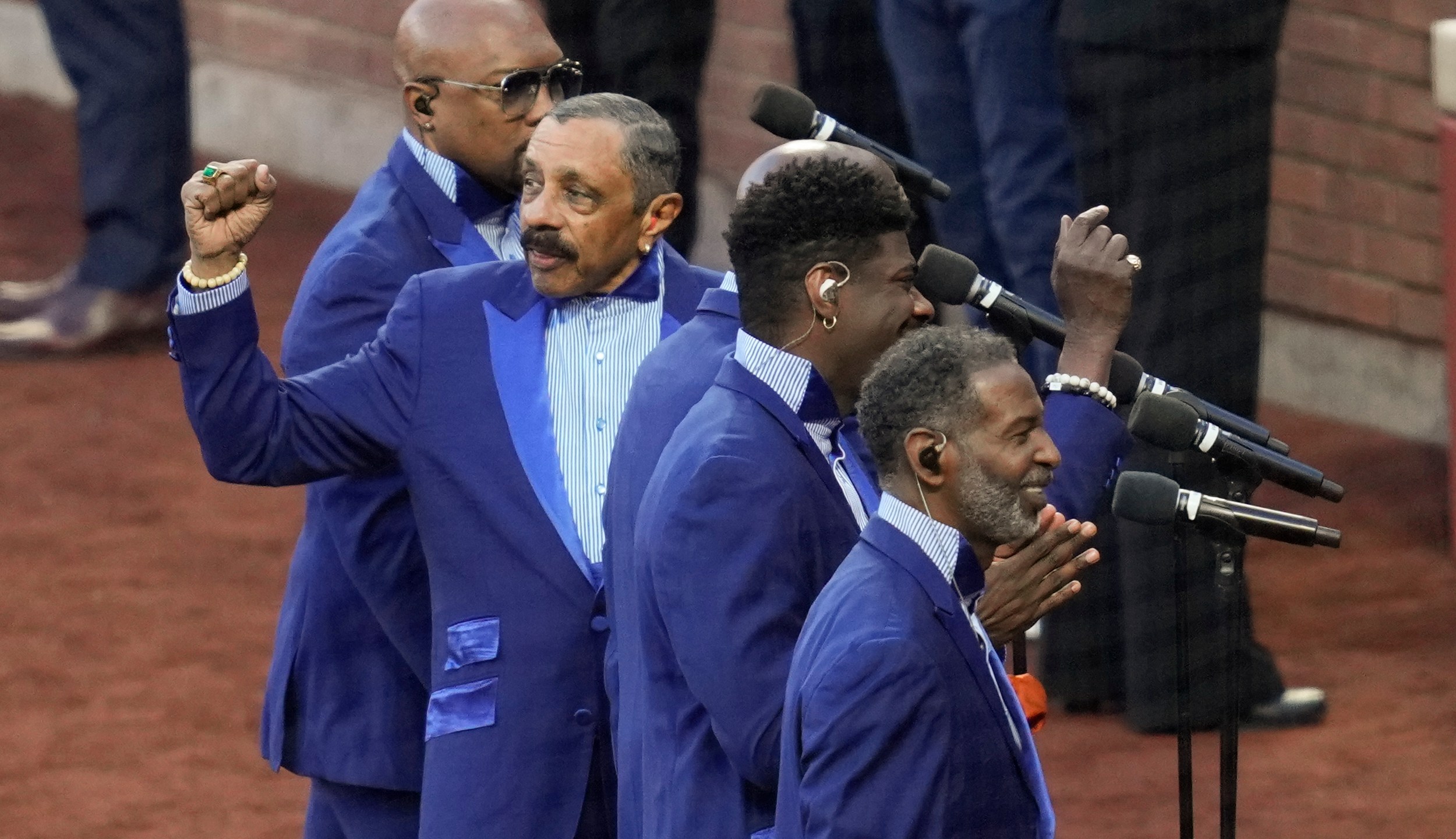 The Temptations perform before Game 5 of a baseball NL Championship Series between the Los Angeles Dodgers and the New York Mets, Friday, Oct. 18, 2024, in New York. (AP Photo/Ashley Landis)