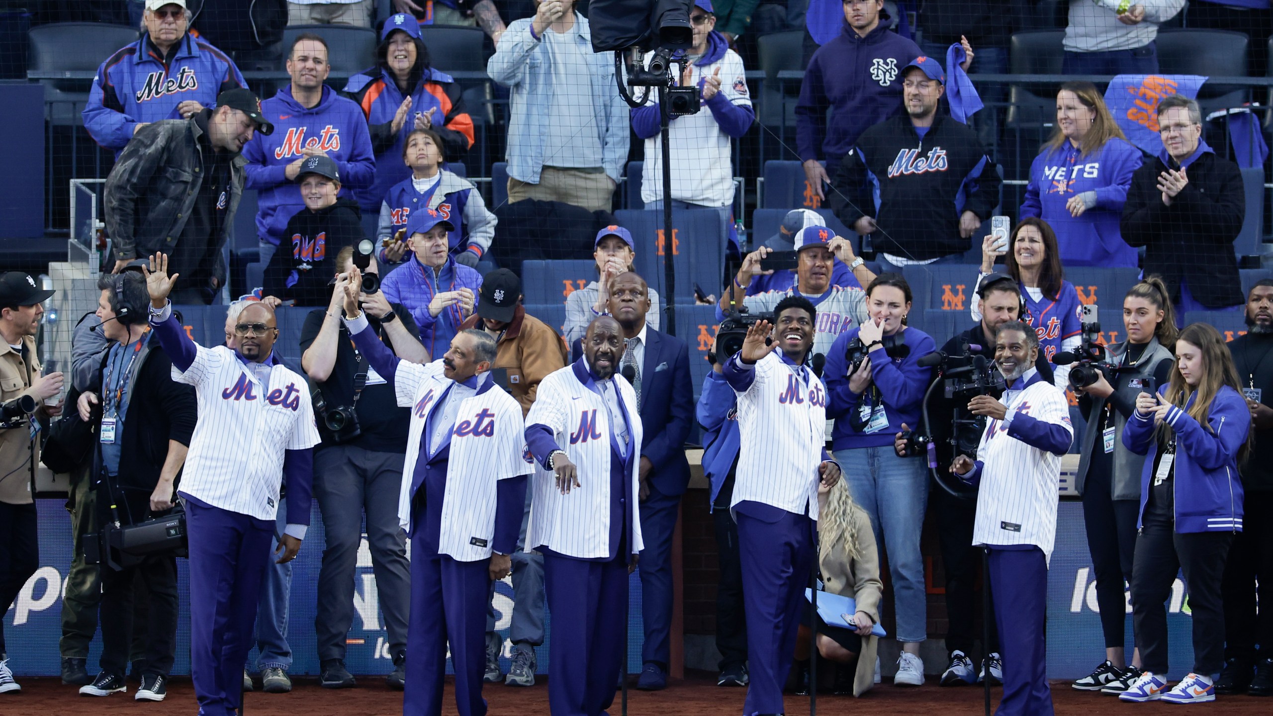 The Temptations perform before Game 5 of a baseball NL Championship Series between the Los Angeles Dodgers and the New York Mets, Friday, Oct. 18, 2024, in New York.(AP Photo/Adam Hunger)