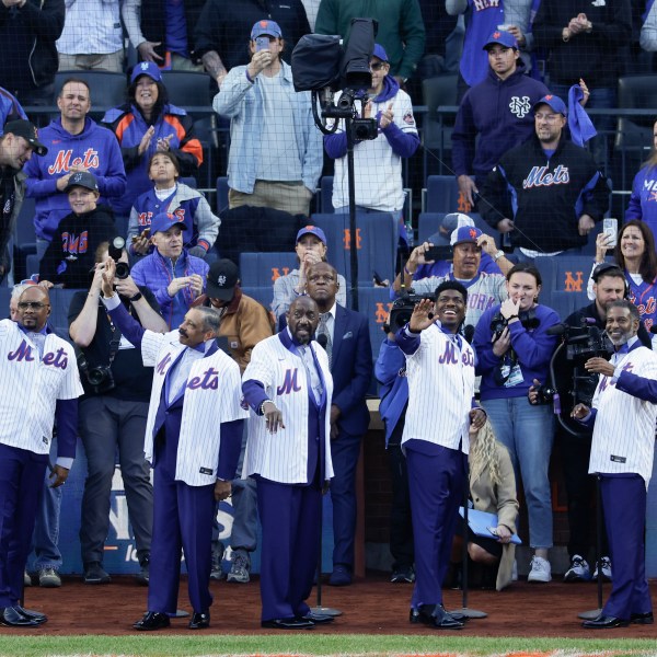 The Temptations perform before Game 5 of a baseball NL Championship Series between the Los Angeles Dodgers and the New York Mets, Friday, Oct. 18, 2024, in New York.(AP Photo/Adam Hunger)