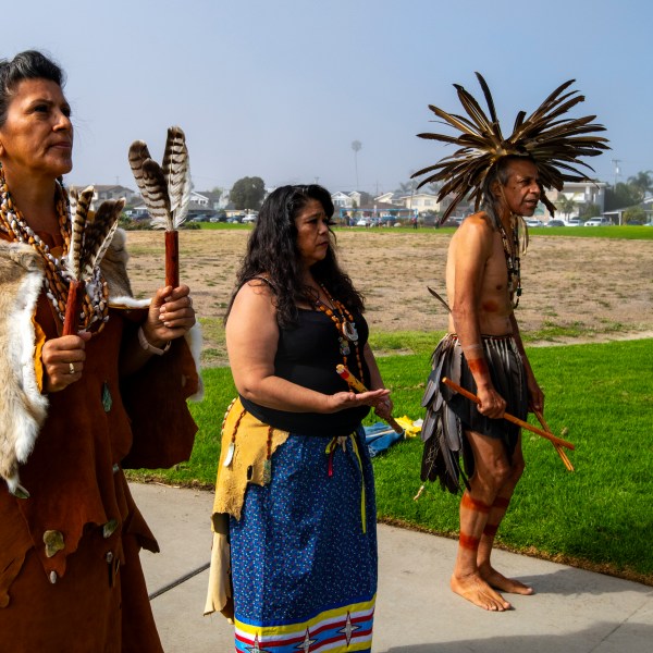 Dancers perform during celebration of "Indigenous Peoples' Day Picnic In The Park 2024" and Chumash Heritage National Marine Sanctuary at Dinosaur Caves Park, Pismo Beach on Monday, October. 14, 2024. (Robert Schwemmer via AP)