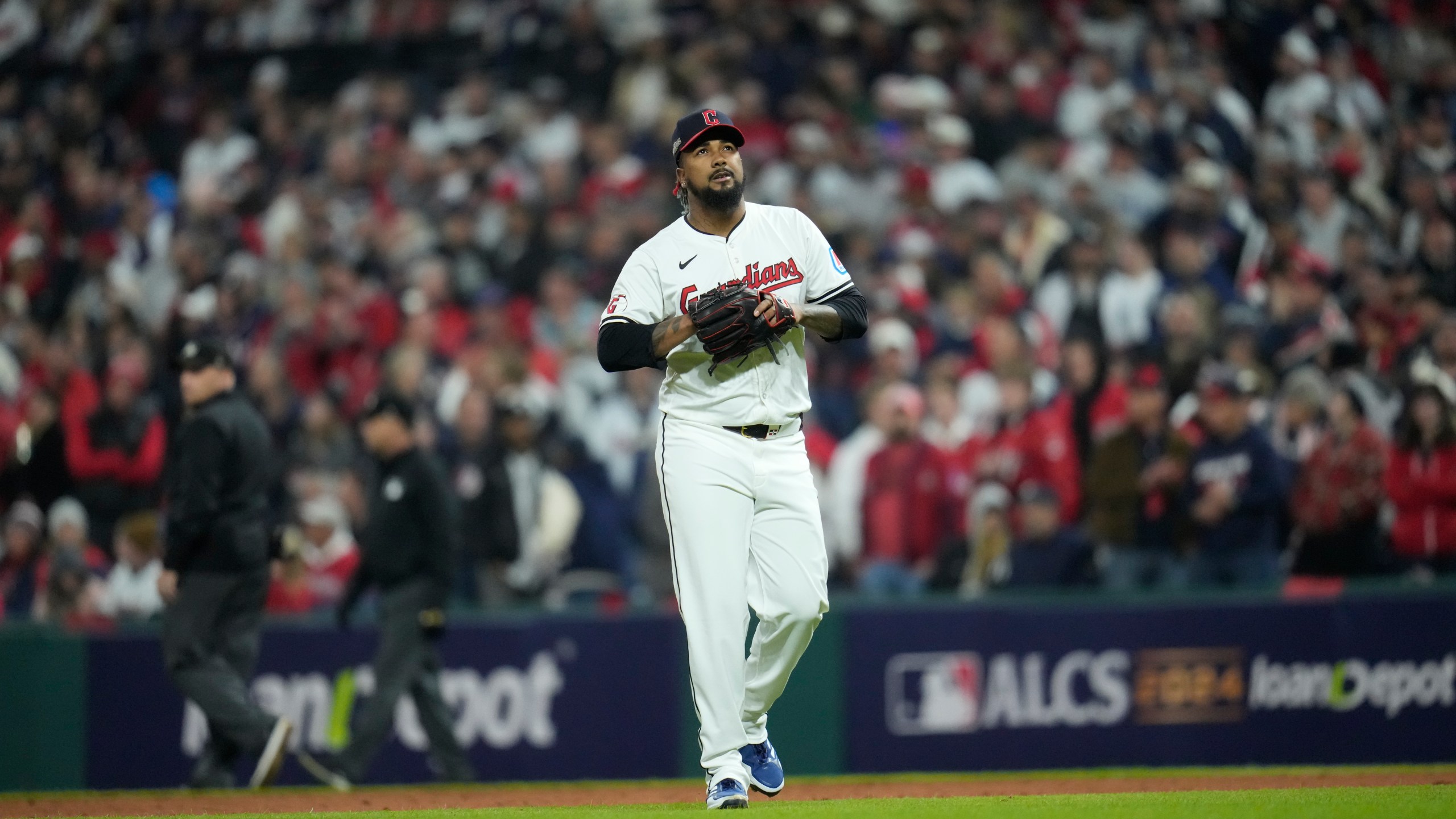 Cleveland Guardians pitcher Emmanuel Clase walks toward the dugout after throwing against the New York Yankees during the ninth inning in Game 4 of the baseball AL Championship Series Friday, Oct. 18, 2024, in Cleveland. (AP Photo/Sue Ogrocki)