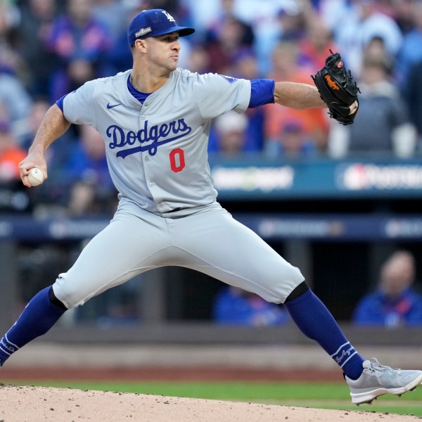 Los Angeles Dodgers pitcher Jack Flaherty throws against the New York Mets during the first inning in Game 5 of a baseball NL Championship Series, Friday, Oct. 18, 2024, in New York. (AP Photo/Ashley Landis)