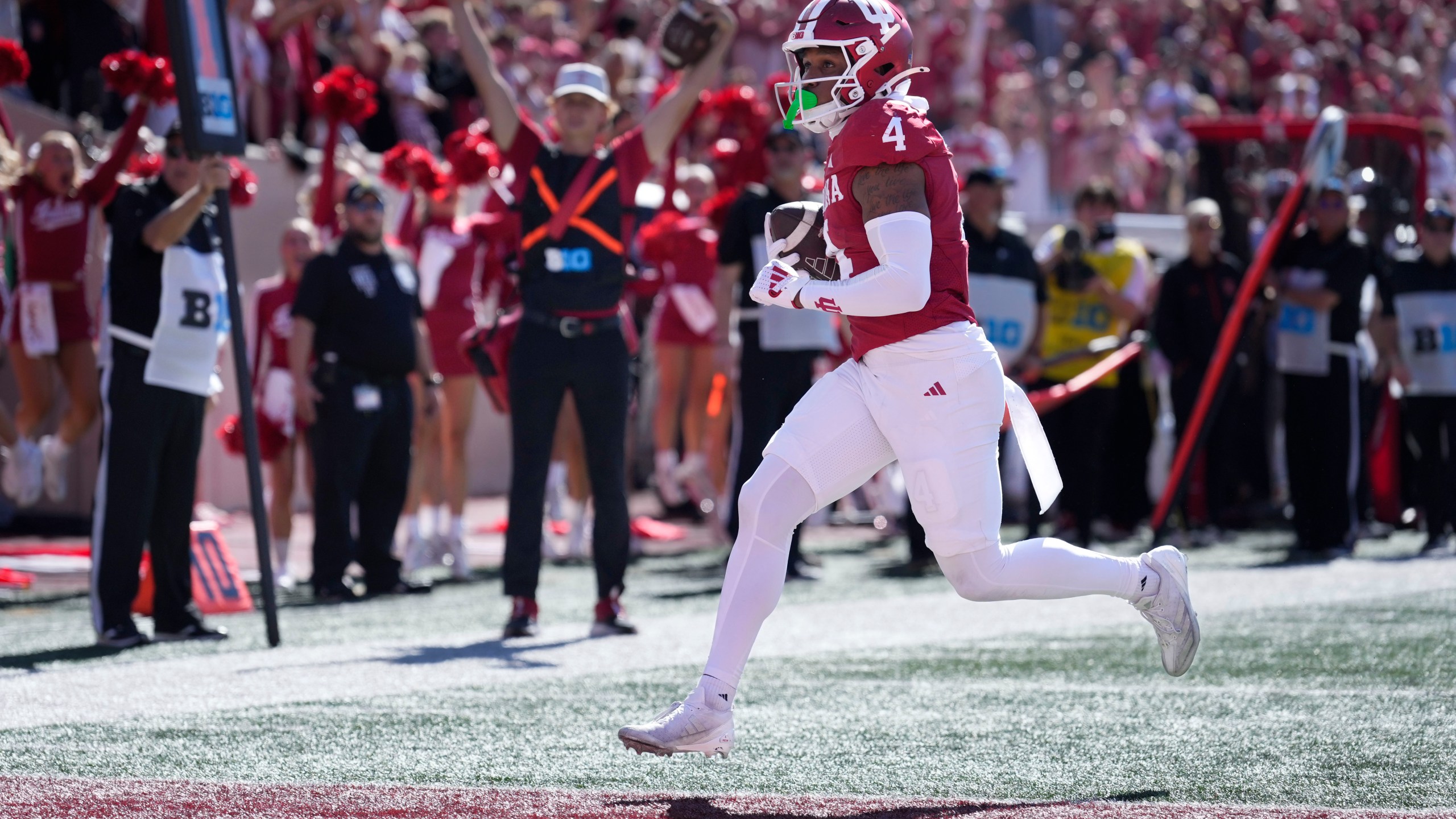 Indiana wide receiver Myles Price (4) scores a touchdown against Nebraska during the first half of an NCAA college football game in Bloomington, Ind., Saturday, Oct. 19, 2024. (AP Photo/AJ Mast)