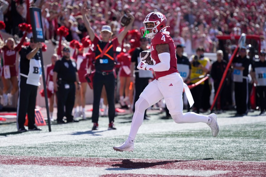 Indiana wide receiver Myles Price (4) scores a touchdown against Nebraska during the first half of an NCAA college football game in Bloomington, Ind., Saturday, Oct. 19, 2024. (AP Photo/AJ Mast)