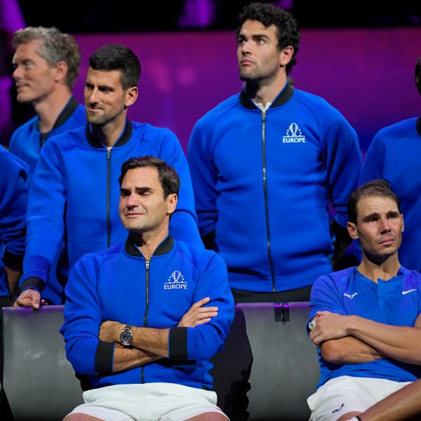 FILE - An emotional Roger Federer, left, of Team Europe sits alongside his playing partner Rafael Nadal after their Laver Cup doubles match against Team World's Jack Sock and Frances Tiafoe at the O2 arena in London, Friday, Sept. 23, 2022. (AP Photo/Kin Cheung, File)