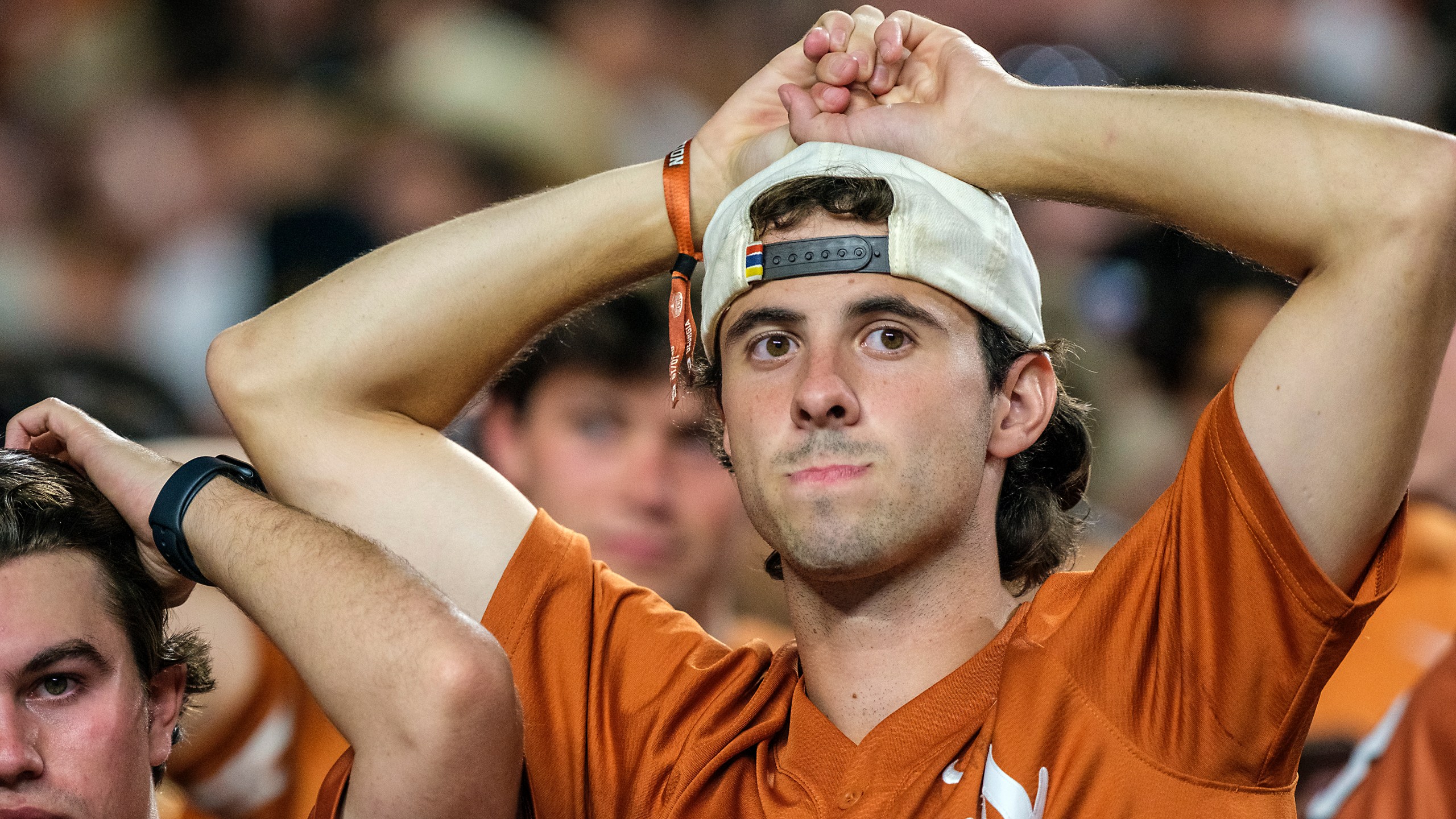 Texas fans watch the clock run out during the second half of an NCAA college football game against Georgia in Austin, Texas, Saturday, Oct. 19, 2024. (AP Photo/Rodolfo Gonzalez)